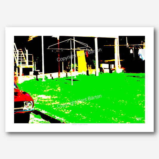 "A grass backyard with clothes line and view to under the house with a Falcon car parked on the driveway."