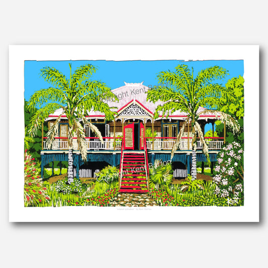 "Street view of classic colonial style house with subtropical gardens."