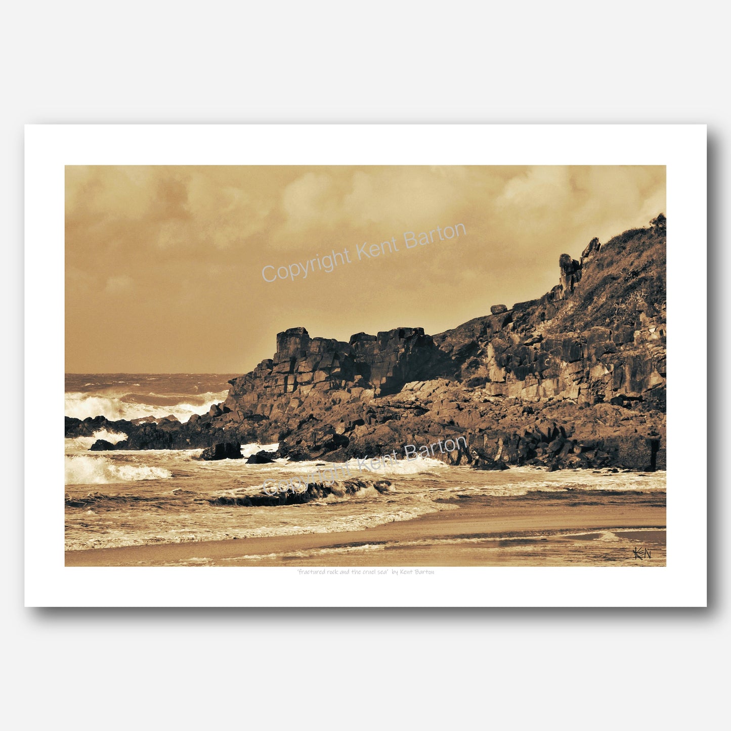 "Weathered rocky outcrop surrounded by the sea in sepia tones."