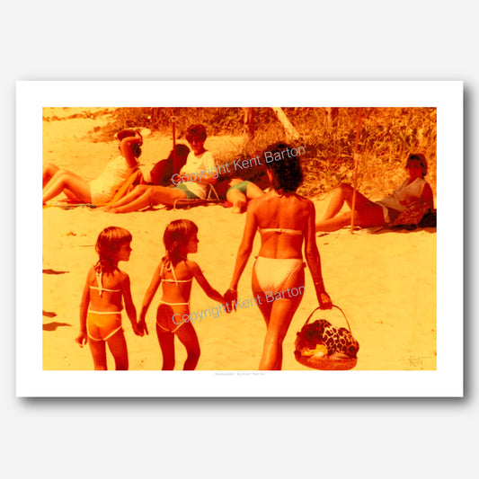 "Mother and two twin daughters draw attention as the walk along the beach in the 80s on the Sunshine Coast."