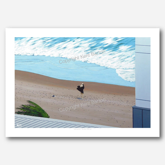 "Man after a swim on a windy beach drying himself with a towel."